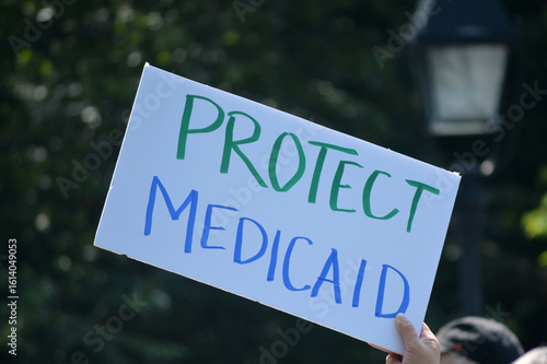 Sign at a rally celebrating Medicare and Medicaid.