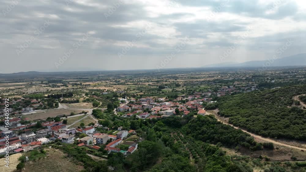 Panoramic Aerial View of Rural Greek Village Surrounded by Farmland and Forest Panoramic Aerial View of Rural Greek Village Surrounded by Farmland and Forest