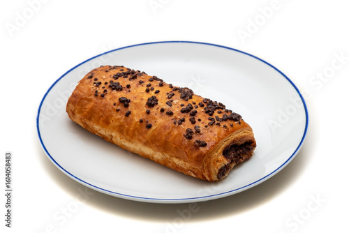 a white plate with a blue ring with a chocolate croissant on a white background