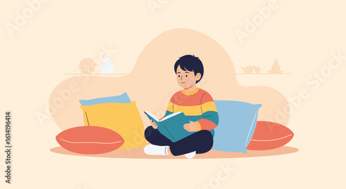 Happy Young Boy Immersed In A Book While Relaxing On Comfortable Pillows