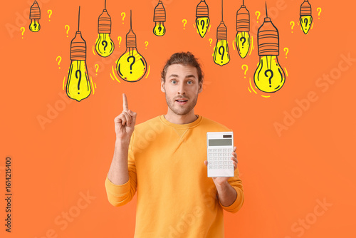 Young man with calculator a...