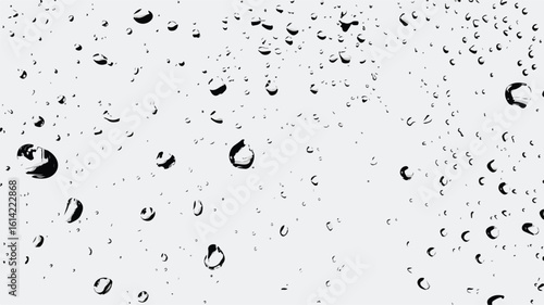 Glass surface with water droplets close-up