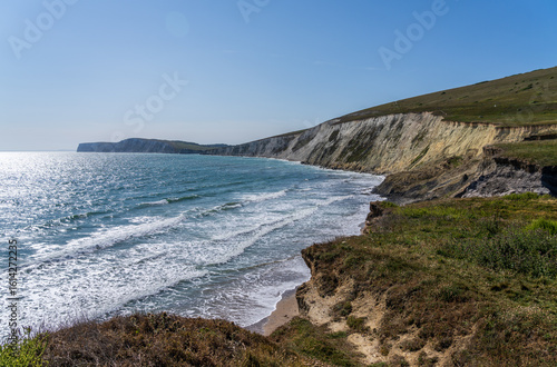 Eroding cliffs in the area known as Dinosaur Coast collapse into the ocean in Compton Bay on the Isle of Wight