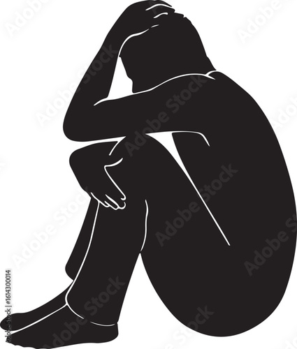 Black silhouette of a person in despair with head in hands sadness loneliness