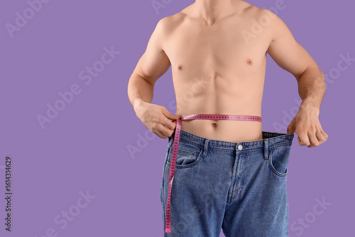 Handsome young sporty man i...
