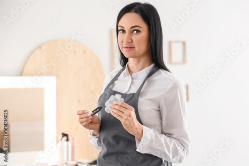 Female hairdresser with too...