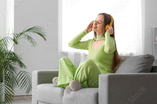 Young woman in headphones s...