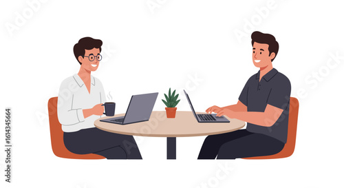 Two Colleagues Working Together on Laptops