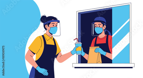 Restaurant workers following safety procedures during pandemic serving food through window