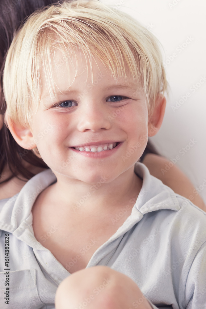happy small caucasian boy smiling to camera. Portrait of happy kid smiling to camera. A cheerful young boy with blonde hair is smiling broadly showing her teeth on nanture background. Natural emotion. happy small caucasian boy smiling to camera. Portrait of happy kid smiling to camera. A cheerful young boy with blonde hair is smiling broadly showing her teeth on nanture background. Natural emotion.