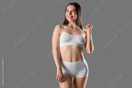 Happy young woman in stylis...