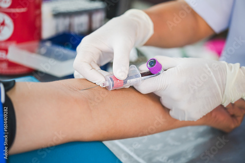 Wallpaper Mural Close up hand of nurse, taking blood sample from a patient in the hospital.	 Torontodigital.ca