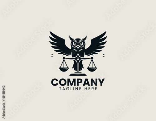 Majestic golden owl with outstretched wings holding scales of justice on a dark background. Legal concept