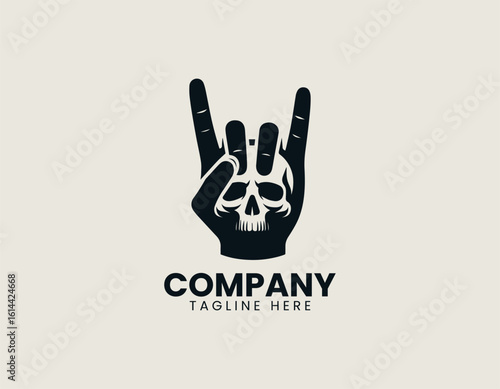 Bold black rock and roll hand gesture with skull incorporated into the design. Music subculture concept