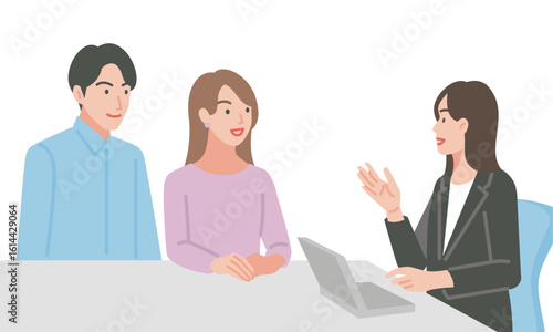 ウェディングプランナーに相談する若い夫婦