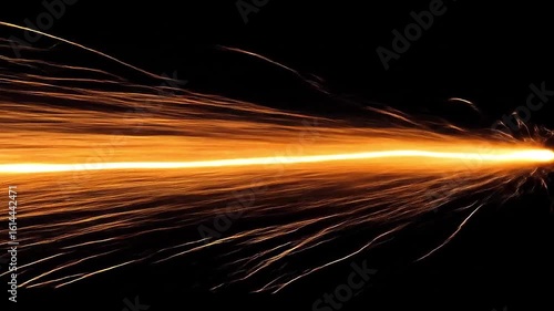 Horizontal trail of fast-moving fire sparks creating wipe effect across black screen