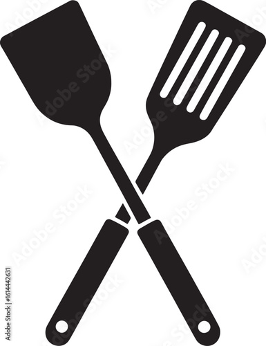Two crossed kitchen spatulas silhouette isolated on white background
