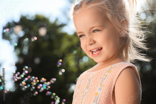 Cute little girl with soap ...