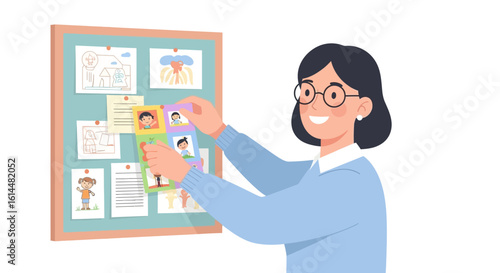 Smiling Woman Arranging Childrens Photos on a Notice Board.