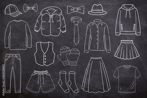 Clothes set seamless set on black background. Sketch of  tie, skirt, shirt, gloves, socks, hat, cap, pant, and sweater on chalk board. Line art of  clothes