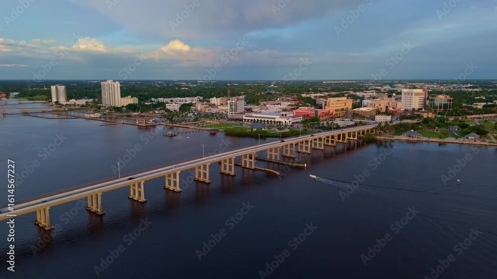 Large bridge over river leading to Fort Myers city in Florida, aerial establisher Large bridge over river leading to Fort Myers city in Florida, aerial establisher