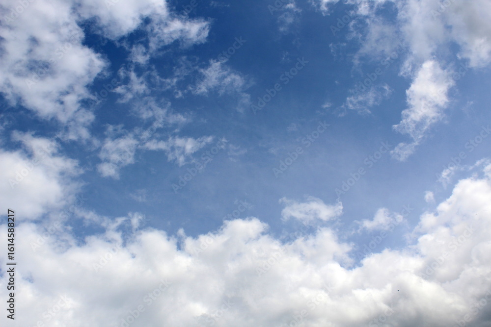 Background of blue bright sky with dark clouds. Background of blue bright sky with dark clouds.