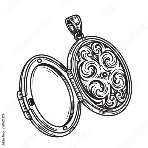 Ornate engraved locket open showing details of beautiful swirls and floral ornament