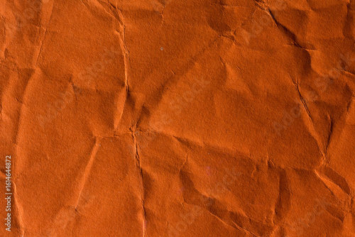 Orange crinkle paper background.