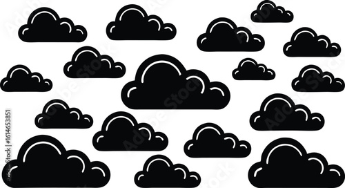 Collection of fluffy black clouds in silhouette