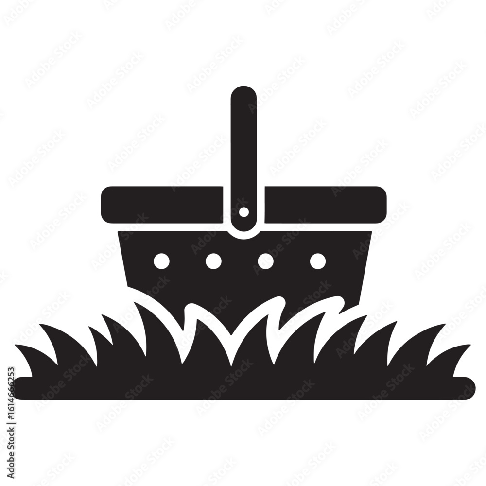 Obraz premium Simple black picnic basket on green grass outdoors icon illustration