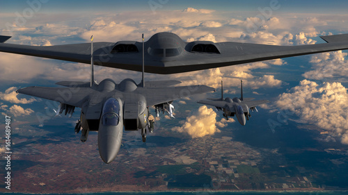 Fotografie B-2 Spirit bomber escorted by an F-15