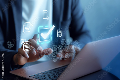 Businessman happy touching approved document icon on digital documents Quality assurance and online evaluation of business concept.