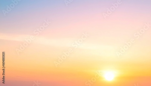 Soft Gradient Sunrise With Yellow Orange And Pink Hues In A Blurry Abstract Sky With Light
