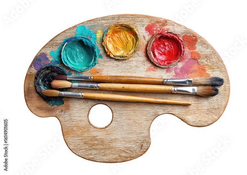 Wooden artist's palette with colorful paints and paintbrushes