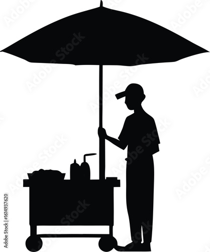  silhouette of street vendor preparing food