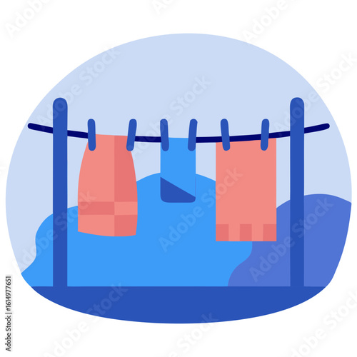 Clothesline with pegs and colorful towels hanging under blue sky  