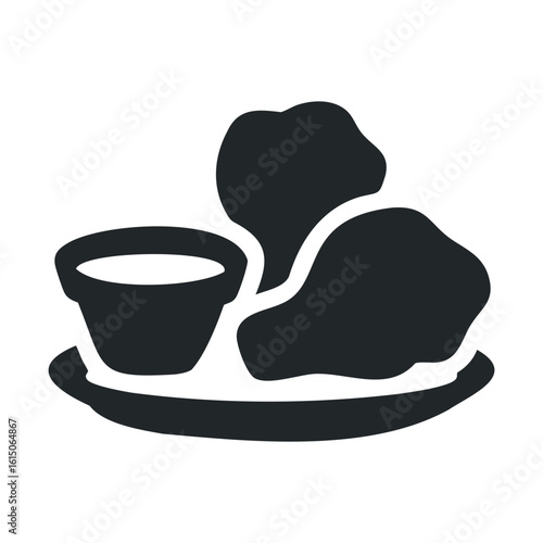 Black and white icon of fried chicken with dipping sauce on a plate