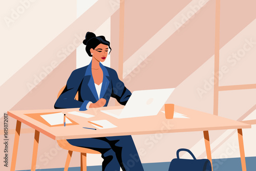 Elegancka bizneswoman pracująca w skupieniu na laptopie w nowoczesnym biurze. Koncepcja kariery, sukcesu i przywództwa kobiet w biznesie.