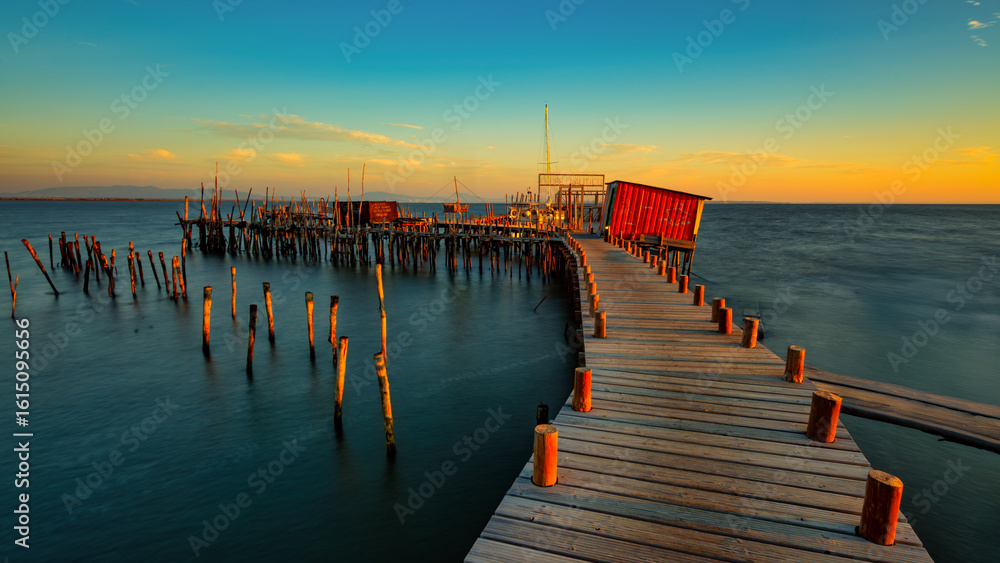 Fototapeta premium sunset on the old fishing pier