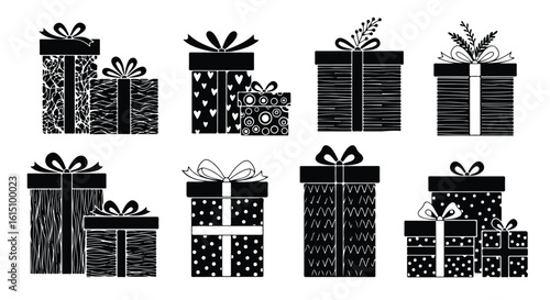 Vector silhouette illustration collection of patterned gift boxes with ribbons on a white background