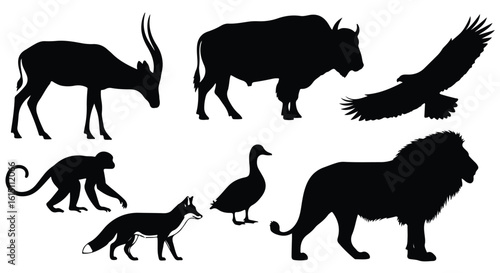 Vector silhouette illustration a diverse array of wild animal silhouettes including a bison, antelope, fox, duck, and eagle, isolated on white