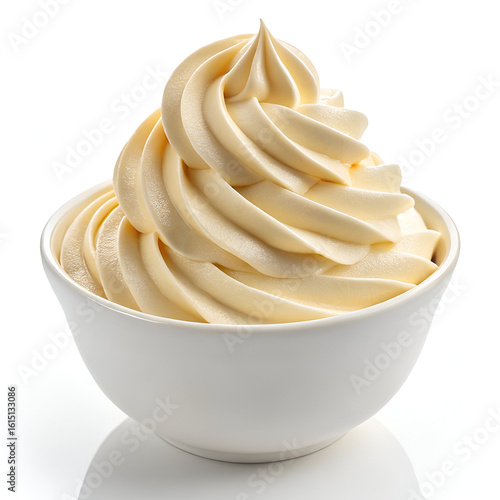A close up shot of vanilla soft serve ice cream in a white bowl against a white background studio shot