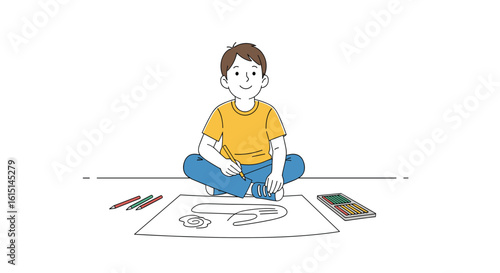 A young boy sits cross-legged on the floor surrounded by art supplies and a drawing he is working on