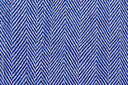 Close-up of a blue and white herringbone textile pattern