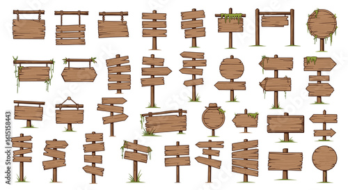 Collection of rustic wooden signposts and directional boards for navigation and information in a natural setting