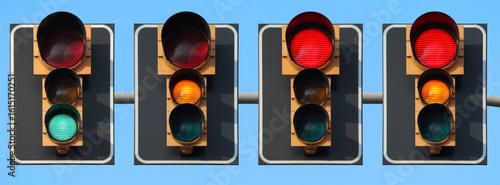 Traffic light sequence: green, yellow, red and red+yellow light, with back plate and bigger red light with the sky as background.