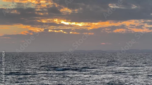 people watching the sunset on Okinawa's American Village promenade