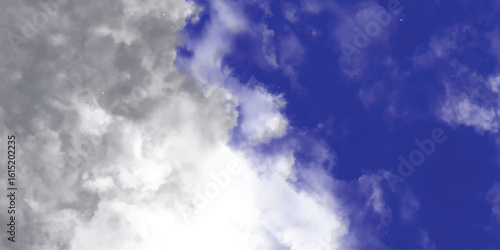 Artistic sky background with fluffy clouds in various shades of grey white and blue ideal for digital designs