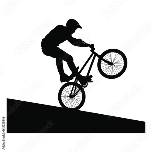 Vector silhouette of a BMX rider performing a wheelie trick on a ramp. Freestyle bicycle motocross athlete doing an extreme stunt.