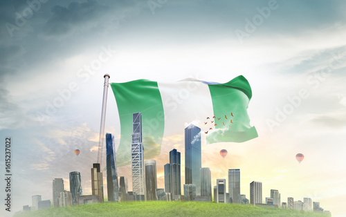 Nigeria national flag wavering with modern building skyline. Country showing stronger and prosperity. Flag key visual. Nigeria national flag for independence day.